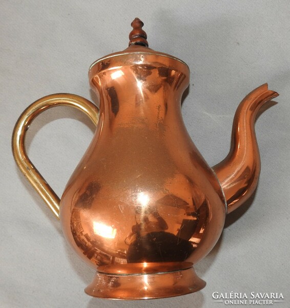Red copper jug with copper handle
