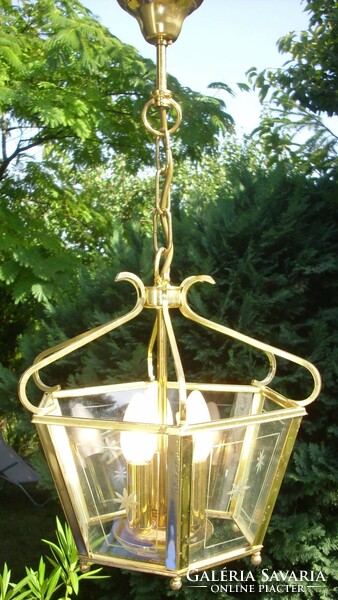 Polished glass chandelier with 3 burners