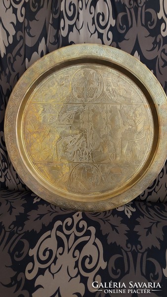 Large copper wall bowl with Egyptian motifs. 50 cm diameter.