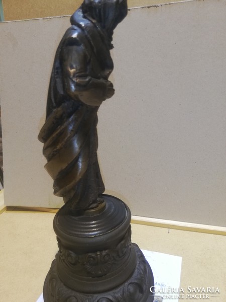 Monk with bronze pedestal