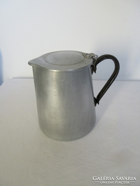 Old. Aluminum large spout with metal handle. Negotiable!