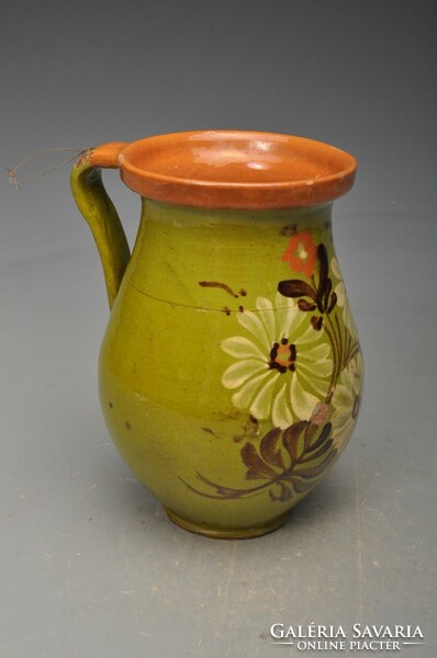 Milk bastard of the Great Plain (Mezőtúr) with green glaze and floral decoration.