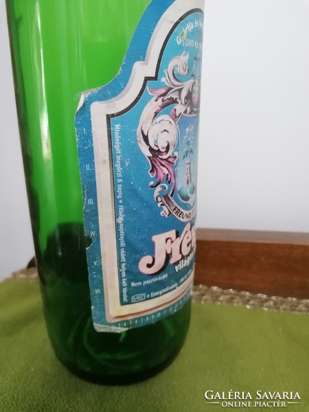 Old beer bottle with buckle