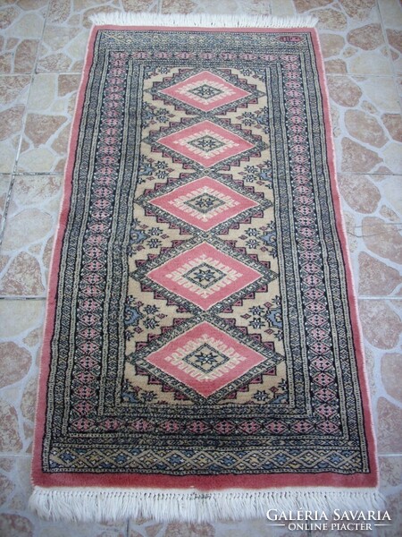 Pakistani handmade Persian carpet in signed material 130x65cm