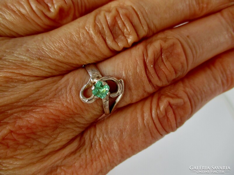 A special silver ring with a beautiful genuine emerald stone