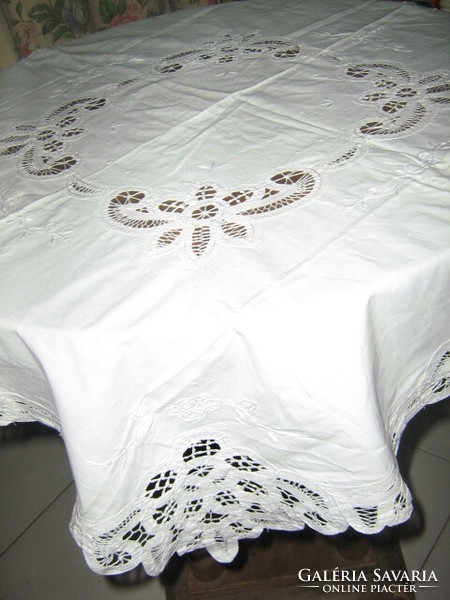 Dreamy white floral hand embroidered sewn round lace tablecloth