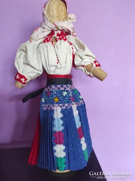 Doll in folk costume.