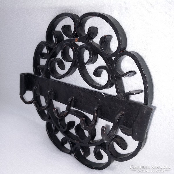 Round, wrought iron, wall key holder, hanger.