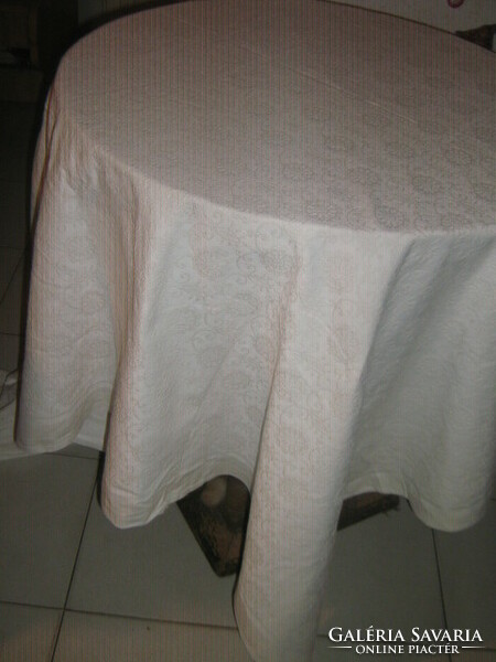 Beautiful cream colored floral elegant woven tablecloth