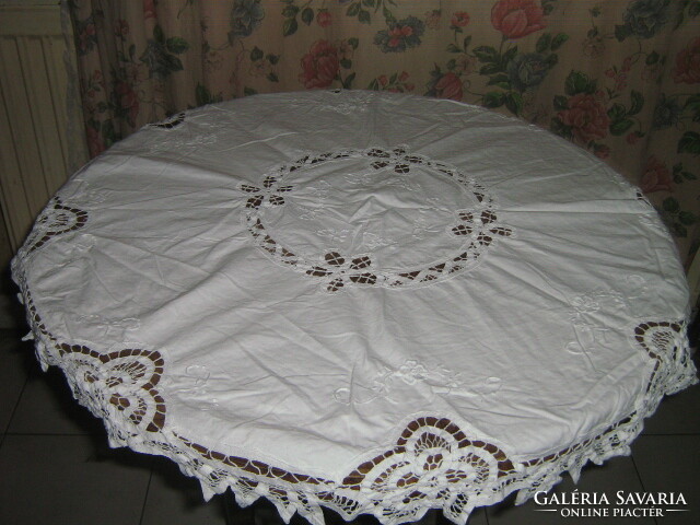 Dreamy white floral hand embroidered sewn round lace tablecloth
