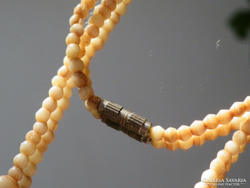 Tribal carved wood and bone necklaces