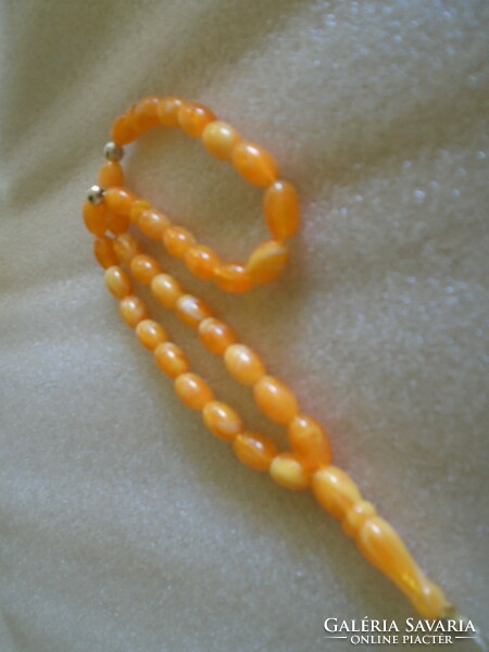 Old Buddhist mala prayer chain amber or vinyl?