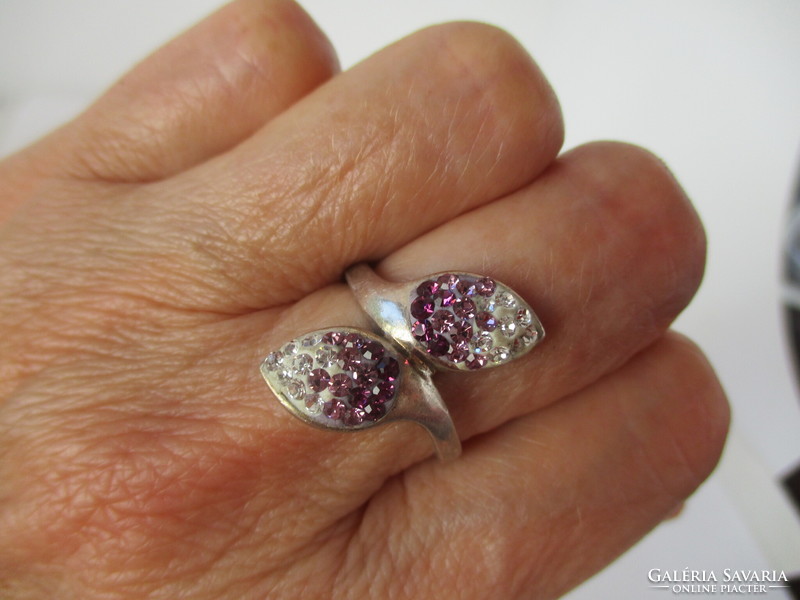 A very nice large silver ring with purple stones