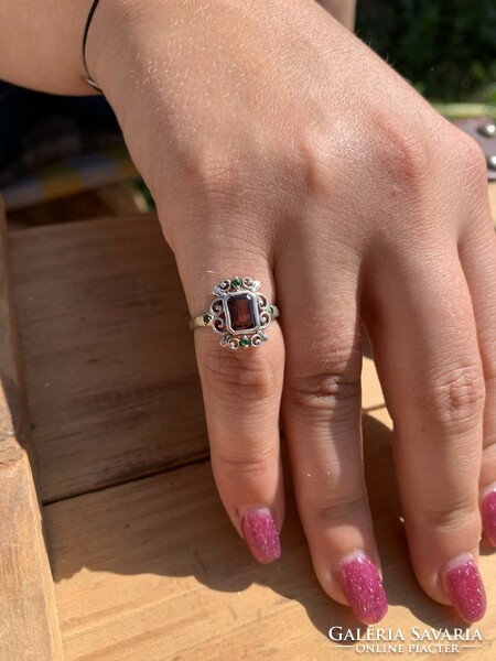 Women's silver ring with red and green stones