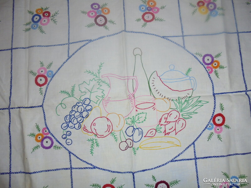 Old, hand-embroidered, fruit-patterned kitchen wall protector