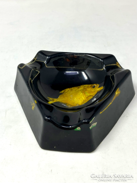 Special Brazilian retro plastic ashtray with ashes prepared yellow piranha, piranha fish