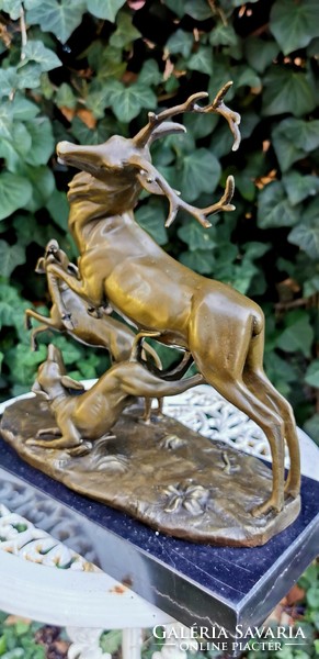 Hunting dogs attacking deer - a prestigious bronze sculpture work of art