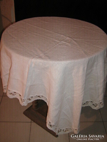 Beautiful antique white lacy edged woven tablecloth