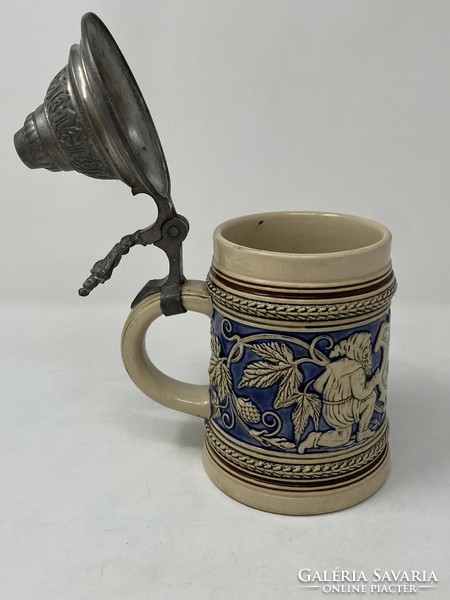 Old antique German beer mug with tin lid, bier stein - stone mug