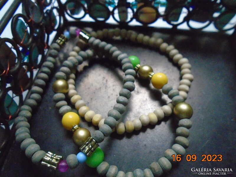 2 gray and 1 light beige bracelet decorated with colorful and gold tone pearls