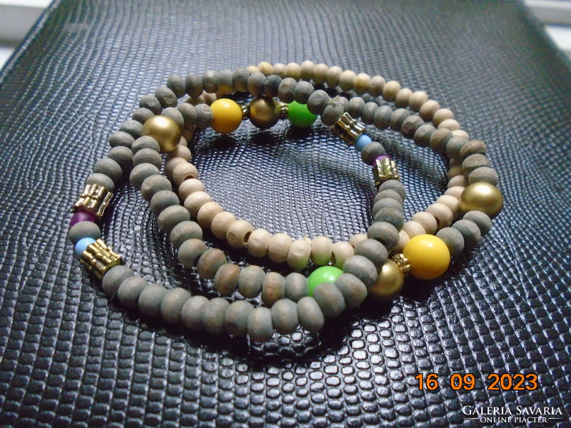 2 gray and 1 light beige bracelet decorated with colorful and gold tone pearls