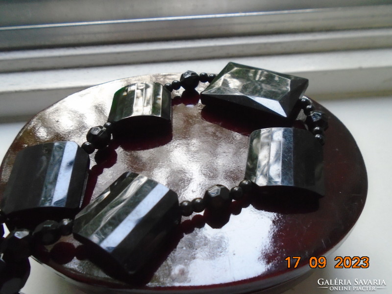 Spectacular necklace made of faceted black pearls with 4+1 faceted black pendants