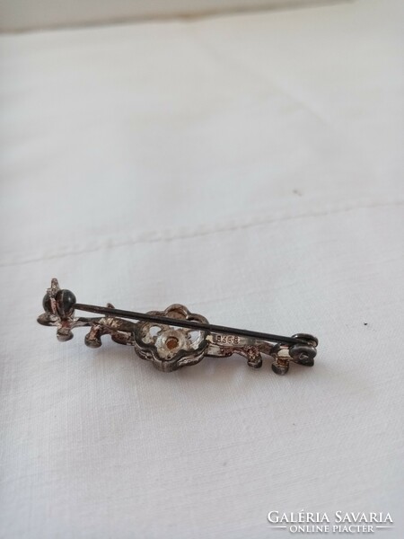 Old silver brooch pin