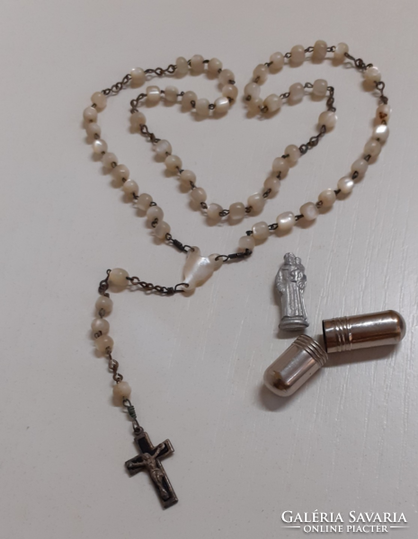 Nun's rosary made of antique mother-of-pearl with a small traveling saint in a small metal lockable jar