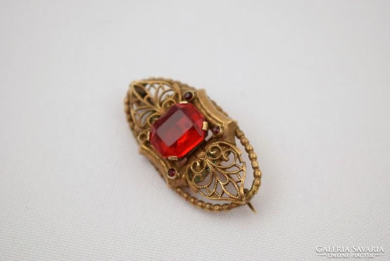 Old copper brooch pin / with red frosted glass