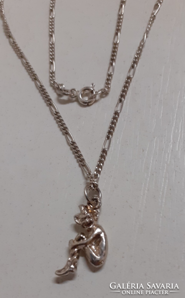 Nice condition 925 hallmarked necklace with a silver lucky elf pendant in good condition