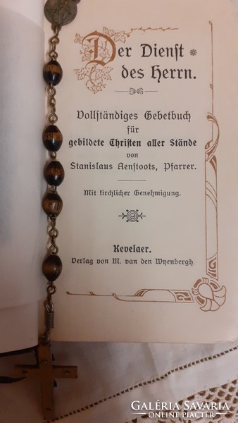 Old German priest's bequest gold-edged prayer book from 1985 with the objects shown in the picture