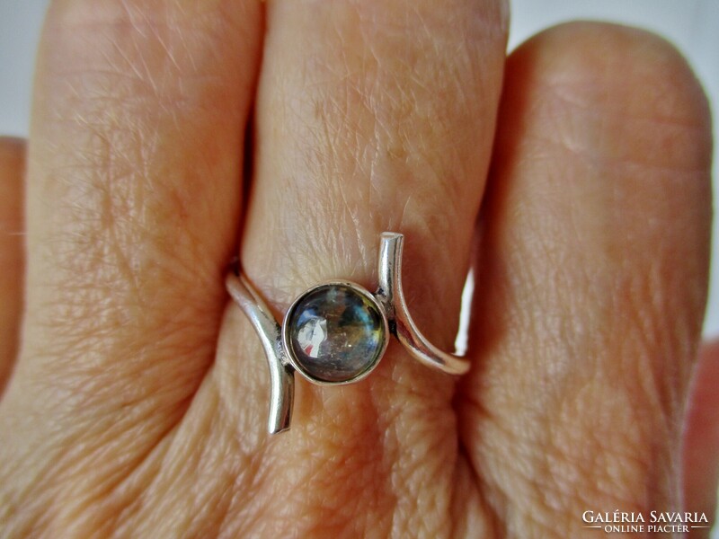 A wonderful silver ring with a rare polished labradorite