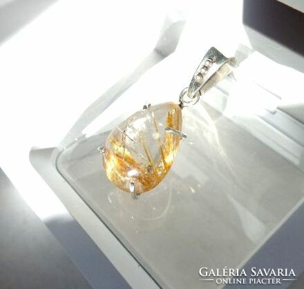 Gold rutile quartz pendant set in 925 silver
