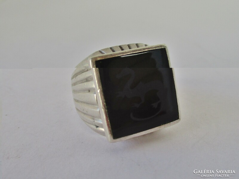 Beautiful old handmade silver ring with engraved onyx stone