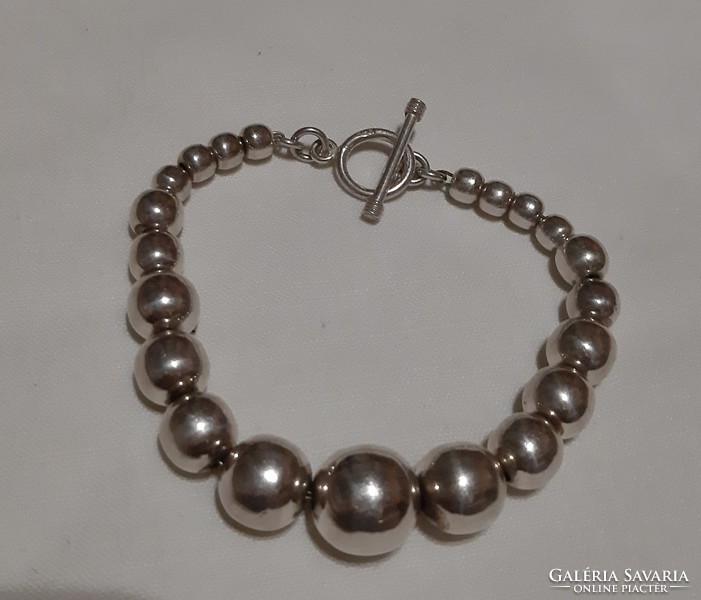 925 silver bracelet decorated with signs and spheres!