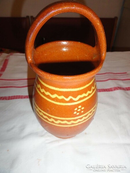 Brown folk earthenware jugs