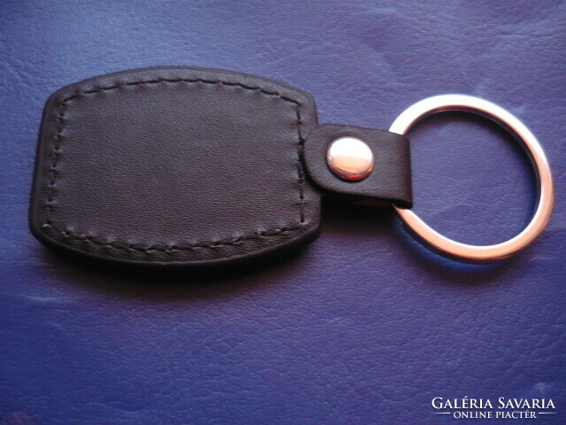 Bmw (car) metal key ring on a leather base