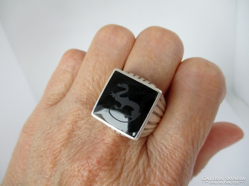 Beautiful old handmade silver ring with engraved onyx stone