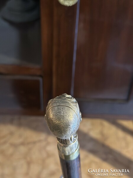 Walking stick with a special bronze handle