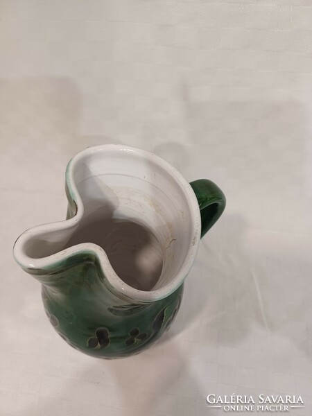 Green ceramic wine jug