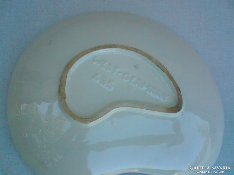 Old ceramic amorphous bowl