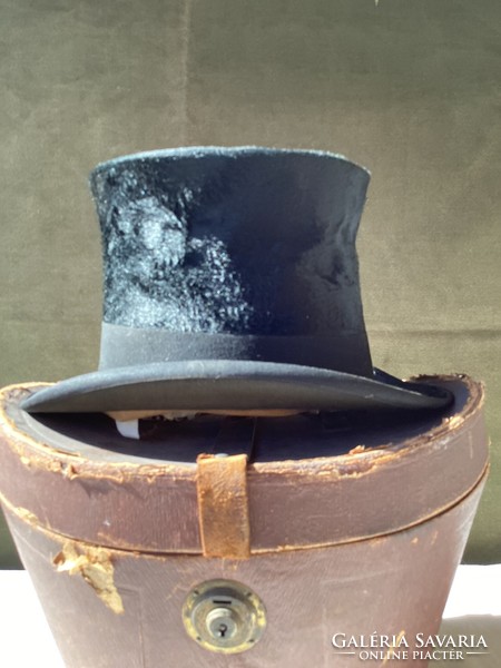 Antique Viennese top hat in a lockable box.