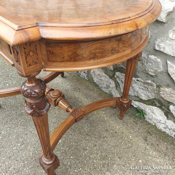 Decorative table with carved legs