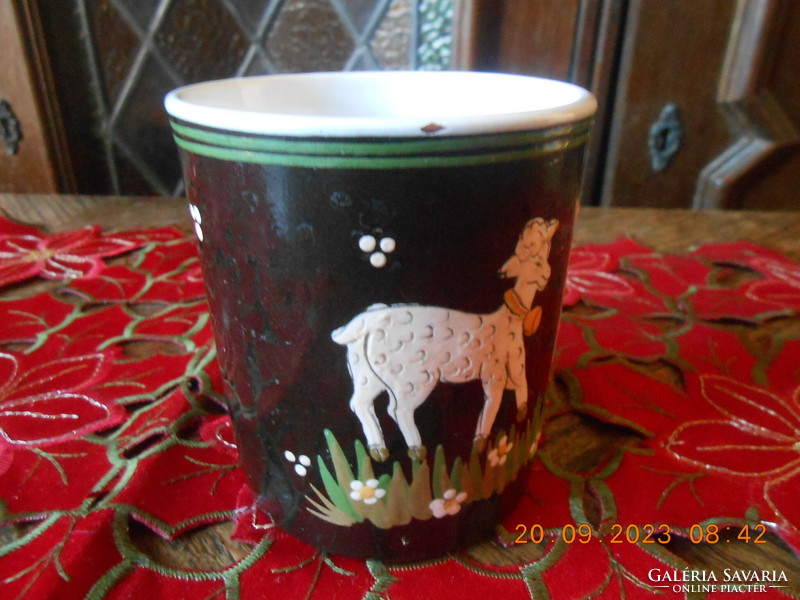 Handmade ceramic mug with hand-painted lamb motifs