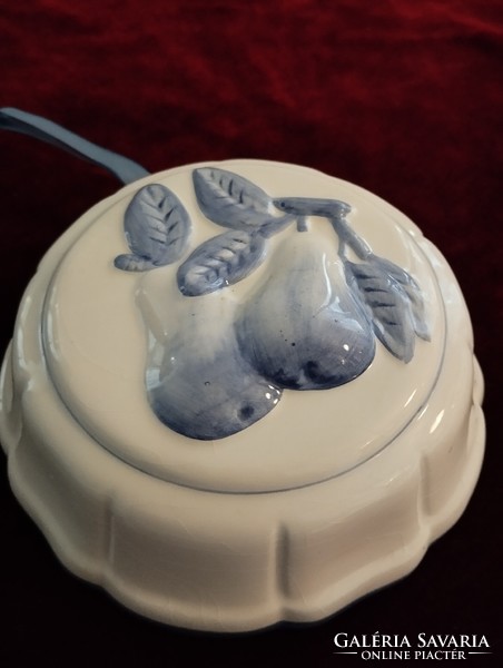 Porcelain pudding molds with 3 different designs in perfect condition