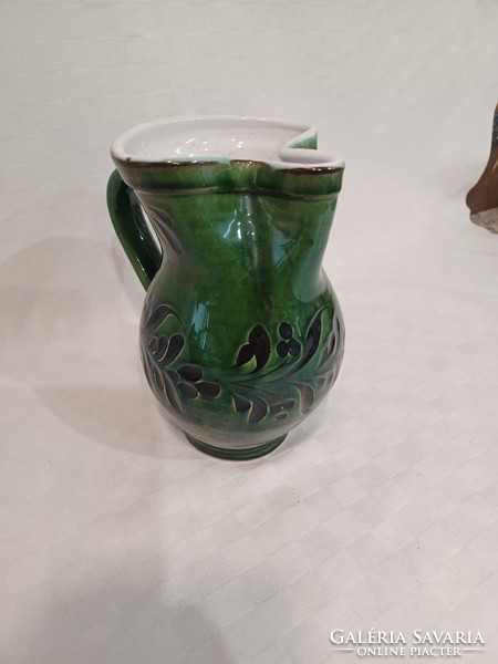 Green ceramic wine jug