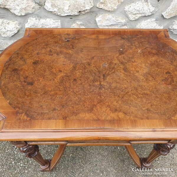 Decorative table with carved legs