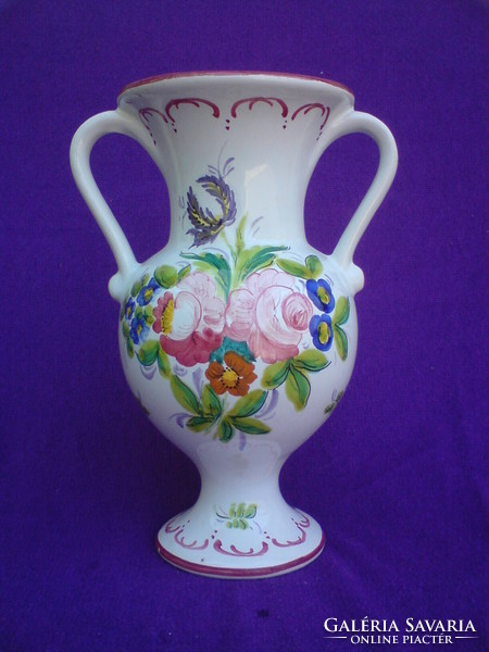 Gracefully shaped two-eared ceramic vase