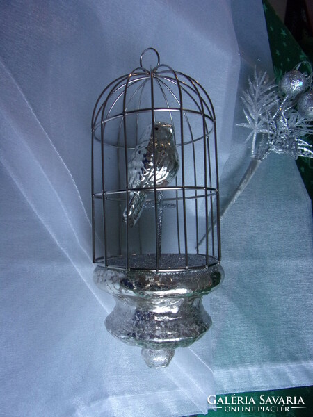 Glass bird in a cage