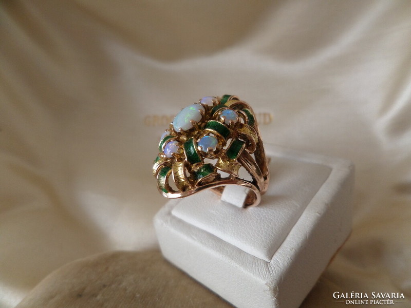 Gold cocktail ring with real opals and green enamel